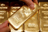 أسعار الذهب تكسر ذروة الـ3500 وتهبط 2%